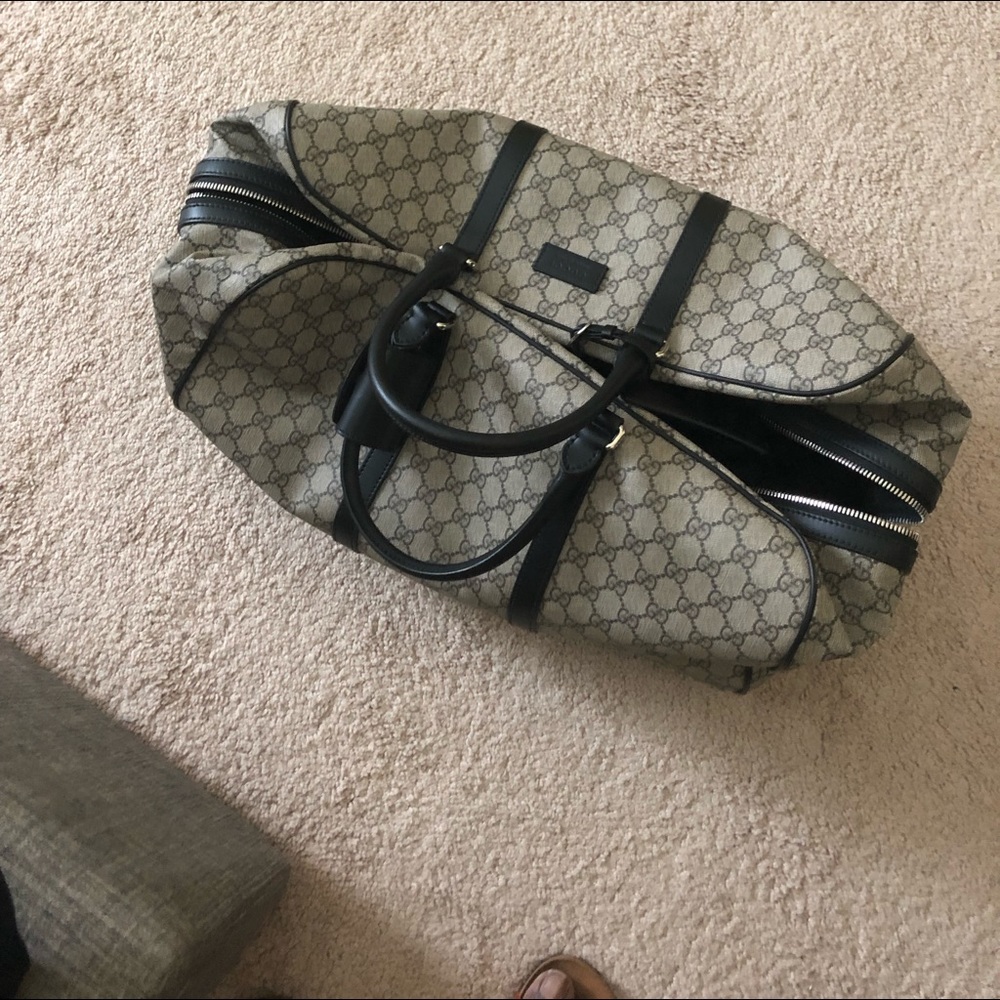 Authentic Gucci 45  duffle luggage on wheels